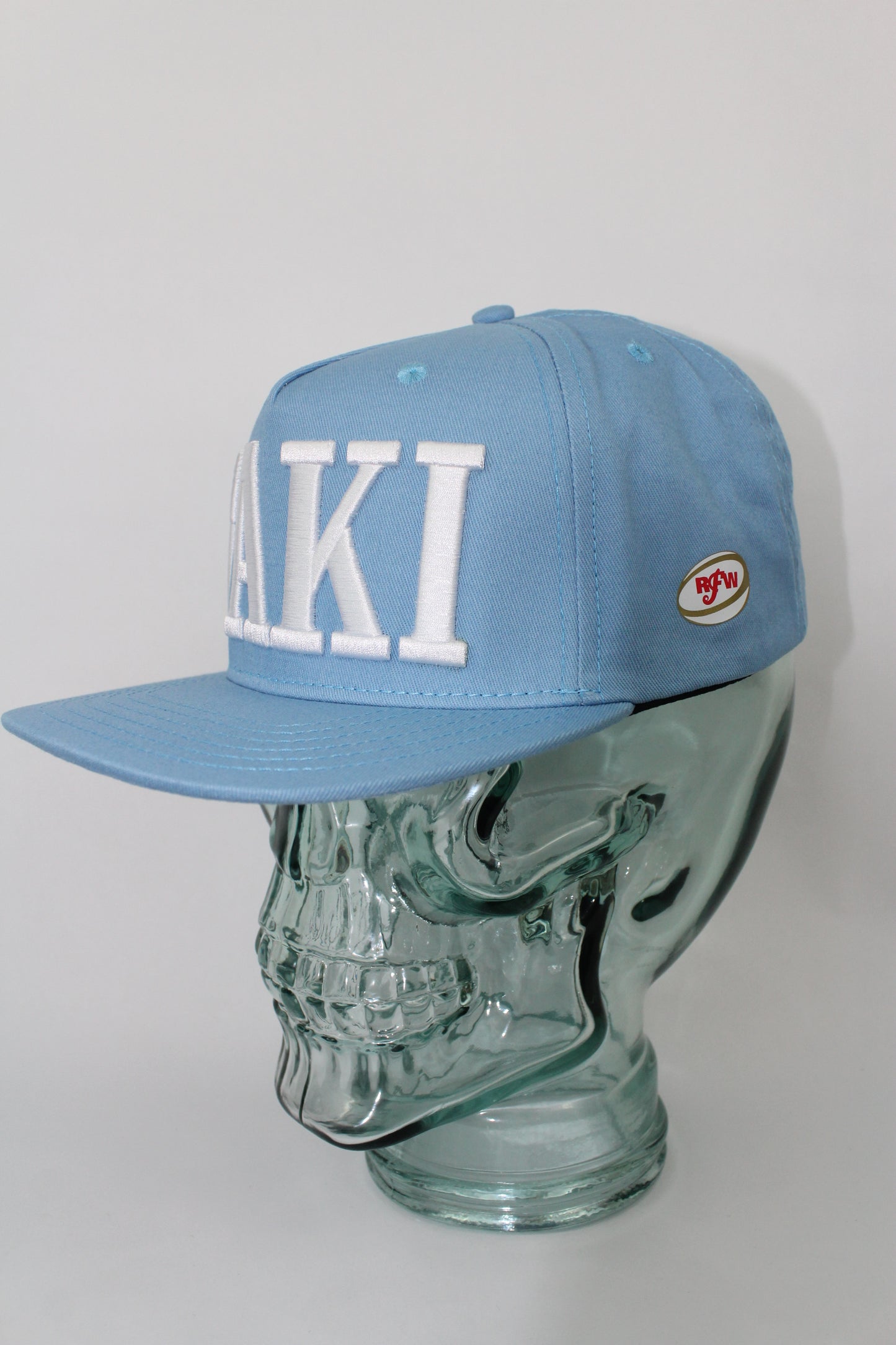 TAKI Baby Blue Snap Back hat