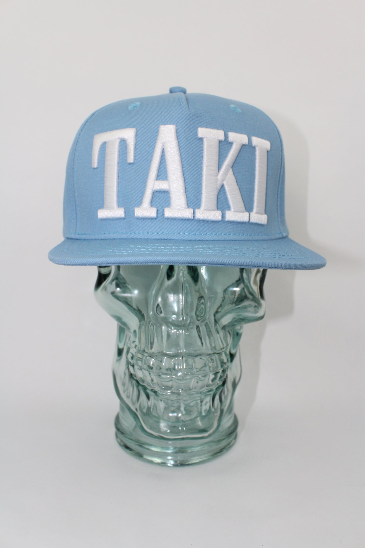 TAKI Baby Blue Snap Back hat